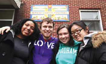 GO! Camden students (left to right): Aisha Blake, Dan Drolet, Allison Greco, and Michelle Ahn outside the Romero Center in Camden, N.J. Photo by Bruce Gilbert