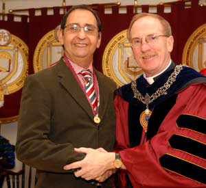 Caputo with Father McShane in March 2008 after receiving the Archbishop Hughes medal for 40 years of service. 