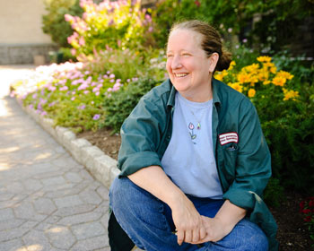 WHO SHE IS University Gardener, Department of Facilities Operations TIME AT FORDHAM 10 Years BACKGROUND Helen has a degree in horticulture and is a 30-year gardening veteran. She began her career at the New York Botanical Garden. WHAT SHE DOES Designs, orders and installs all of the flower beds on the Rose Hill campus, takes care of the bulbs and maintains ornamental trees and shrubbery. BUSY SEASON “We plant about 30,000 bulbs each fall, but May is the busiest month. About two weeks before Commencement, we take the bulbs out and plant the annuals. We also have perennial beds that come back every year. In addition to the flowers, other members of our department cut the grass and seed the lawns so campus looks its best for Commencement and Jubilee.” EARLY RISER “My day starts at 6 a.m., but I’ve done it for decades so I’m used to it. Starting early is key—especially in the summer when it’s really hot. I like to get most of my work done before noon.” FAVORITE FLOWER? “I never really ever thought about it,” said Norgard, who agreed that choosing a favorite flower would be difficult, almost like a parent having to choose a favorite child.