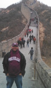 While teaching in Hong Kong, Emmanuel Reed, FCRH '02, is visiting landmarks, including the Great Wall of China.