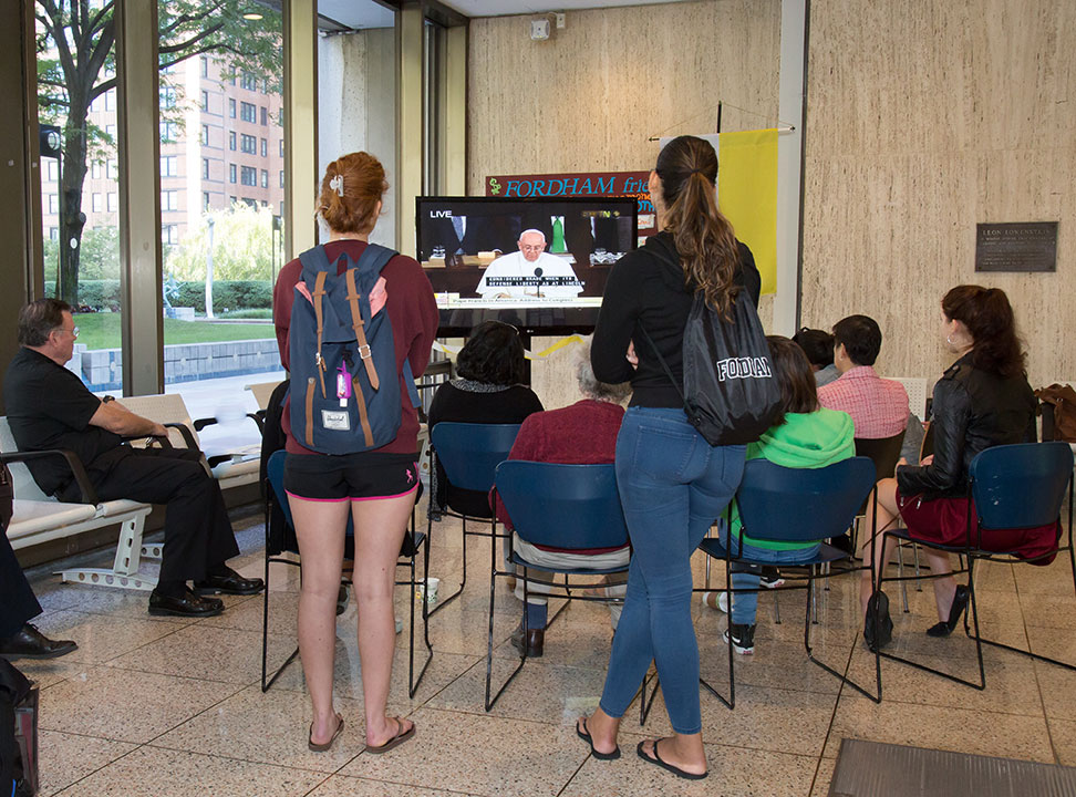 Students watch the live stream of the pope's address to the U.S. Congress on Sept. 24. Photo by Patrick Verel