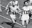 Fordham graduate Tom Courtney crosses the finish line, winning the gold medal in the 800-meter race at the 1956 Olympics.
