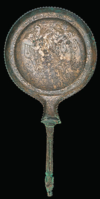 Engraved mirror, Etruscan, Late Classical, ca. 4th century B.C.E., Bronze, h: 11 in. (28 cm), from the Fordham Museum of Greek, Etruscan, and Roman Art