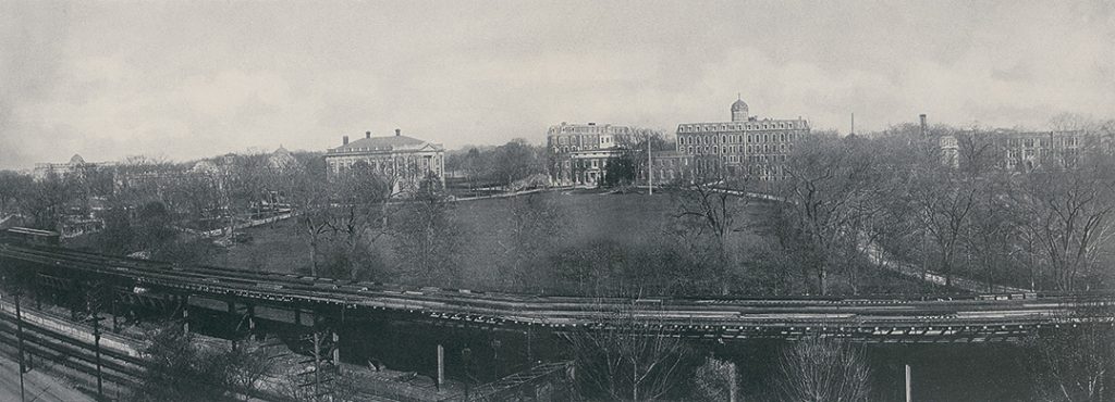 A panoramic image of the Rose Hill campus, circa 1916, shows both the Metro-North and elevated rail lines.