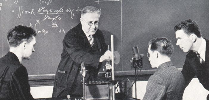 Fordham professor and Nobel Prize-winning physicist Victor Hess in the lab with students, 1940s