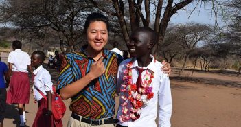 Kang Lee, FCLC '14, in Tanzania with one of his students