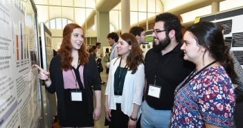 Psychology student Laura Frank, and biology students Olivia Giannakopoulos and Ian Villagran share findings from their research project, "The Effect of Drey Presence on Flight Initiation Distance in the Eastern Gray Squirrel (Sciurus carolinensis) in New York City" at the 2017 Undergraduate Research Symposium on April 26 at the Rose Hill campus.