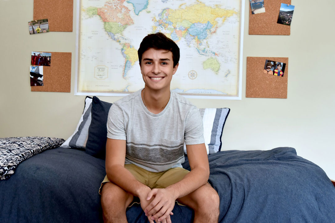 Sotiris Georgakopoulos, of Saint James, New York, in his dorm room in Loyola Hall at the Rose Hill campus. Photo by Dana Maxson
