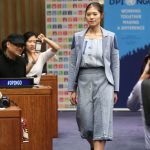 A model showcases sustainable fashions at the United Nations in New York on November 26, 2017.