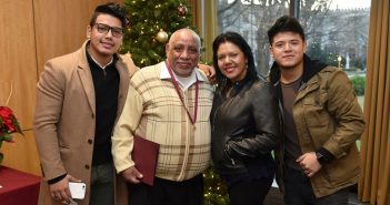 Awardee Milton Domenech, second to the left, is joined by wife and two sons, Erick (L) and Mauricio (R).