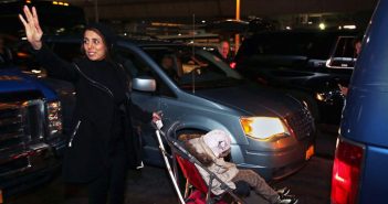 Fahimeh (Farimah) Kashkooli waves goodbye as she and Alma leave the airport.
