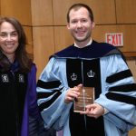(L-R) Donna Rapaccioli, Ph.D., dean of the Gabelli School, with mathematics professor David Swinarski, Ph.D., recipient of the Gratias Tibi Award