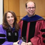 (L-R) Donna Rapaccioli, Ph.D., dean of the Gabelli School, with Brian E. Johnson, Ph.D., a recipient of Faculty Cura Personalis Award.
