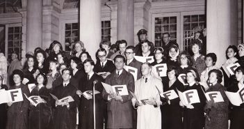 Fordham students from the City Hall Division at 302 Broadway are shown singing at New York City Hall to celebrate Christmas in 1965.