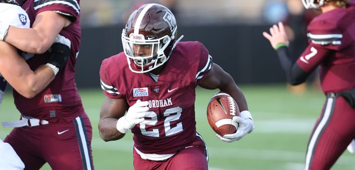 Chase Edmonds, FCRH '18, Fordham football's all-time leading rusher, in a game against Holy Cross