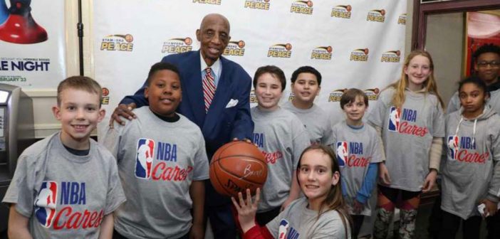 Former New York Knicks star Dick Barnett with young students and athletes at an April 2018 event sponsored by Signature Bank's Scholars Program