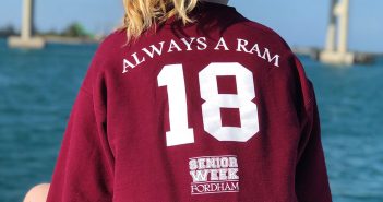 Fordham senior wearing a Fordham Class of 2018 Senior Week shirt that reads: "Always a Ram"