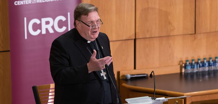 Cardinal Joseph Tobin, archbishop of Newark speaking at a podium at the McNally Ampitheatre