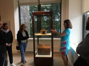 Italian exchange students look at art in Fordham Museum of Greek, Etruscan and Roman Art