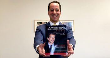 Ponterotto holds a copy of his new book.