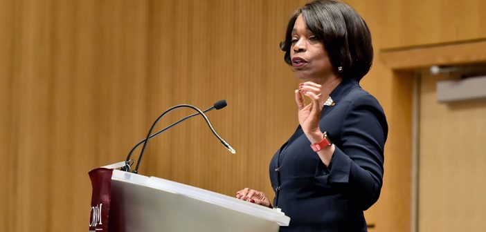 Anita Allen speaks at a podium at the Lincoln Center campus