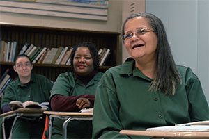 Three students in a classroom at Bedford Hills Correctional Facility, the only maximum security women's prison in New York state