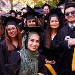 Group of graduates wearing black academic robes