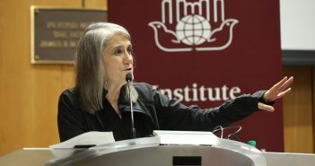 Amy Goodman speaks from the podium at McNally Amphitheatre
