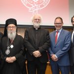 Joseph M. McShane, Archbishop Demetrios, Rowan Williams, George Demacopoulas and Aristotle Papanikolaou stand together on stage.