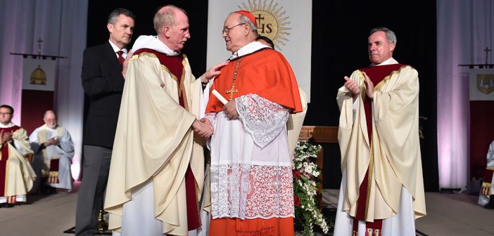 Fordham president Joseph M. McShane congratulates His Eminence Jaime Lucas Cardinal Ortega y Alamino