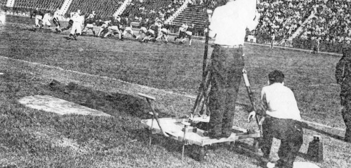Camera crew on the field at Randall’s Island Stadium for a football gabe between Fordham and Waynesburg College, 1939