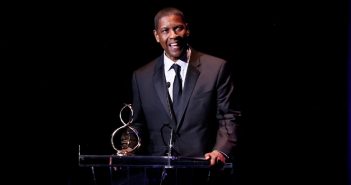 Denzel Washington receives an honor from the Crossroads Theatre Company.