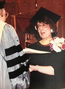 Carolyn Pagani accepting her Fordham diploma