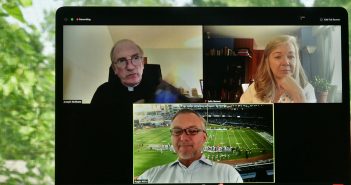 Father McShane, Sally Benner, and Roger Milici shown on screen during the virtual Jubilee 2020.