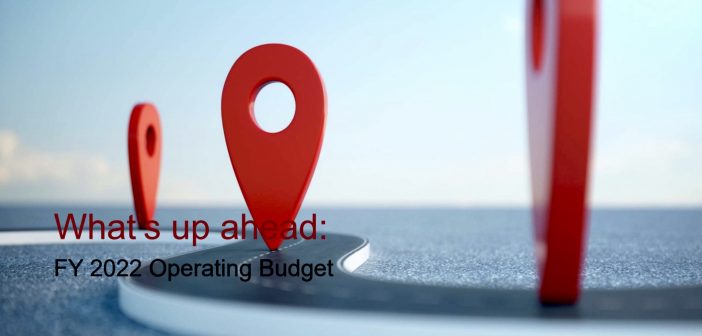An oversized red location logo above the words "What's up ahead: FY 2022 Operating Budget"