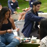 Students eat at picnic