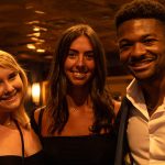 Three recent Fordham graduates on the Young Alumni Yacht Cruise, October 2021
