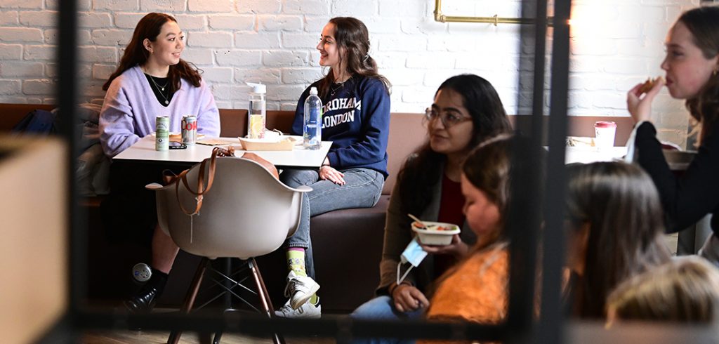 Students take a break in the Fordham London cafe. 
