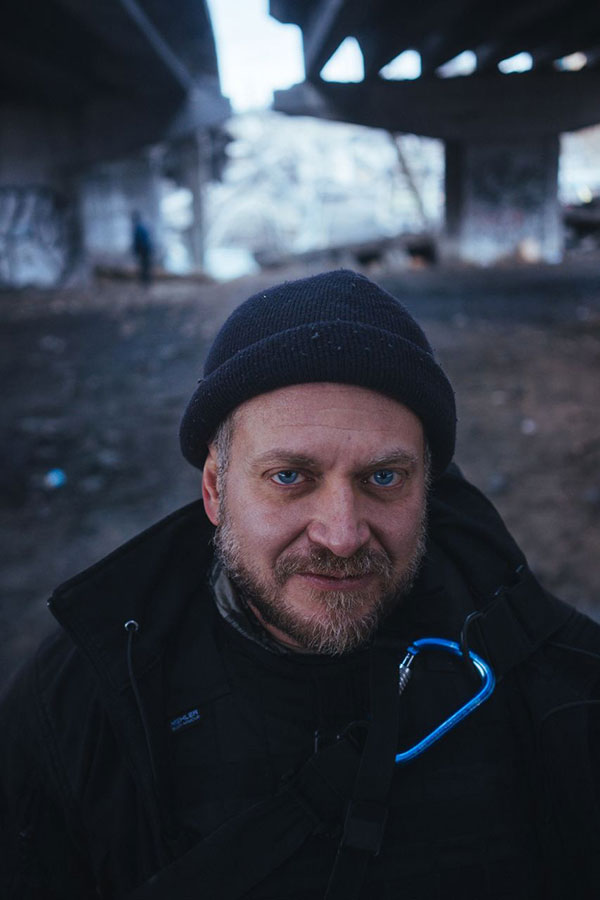 A portrait of Christopher Occhicone working in Irpin, Ukraine, March 7, 2022. Photo by Volodymyr Demchenko
