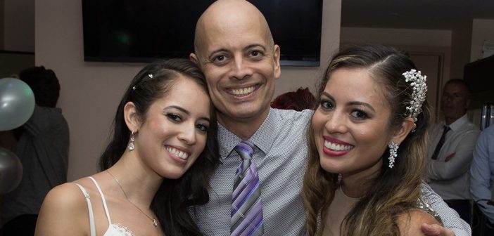 Ray with his daughters