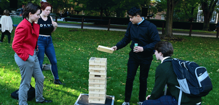 Students playing Jenga