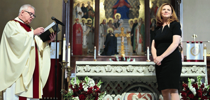 Priest and woman on church altar