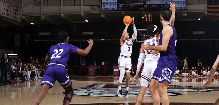 Fordham guard Darius Quisenberry takes a shot in the first half of the Rams' Nov. 22 victory over Stonehill College in the historic Rose Hill Gym.