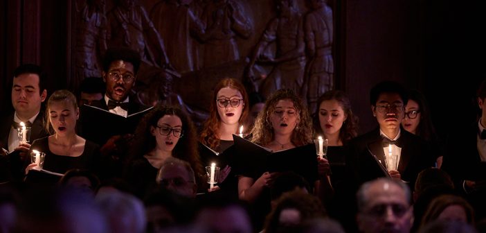 Choir singing with candles