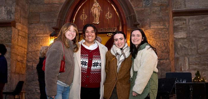Four young women outside church