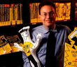 Fordham graduate John Kilcullen, circa 1995, with a display of copies of books in the "For Dummies" series he created