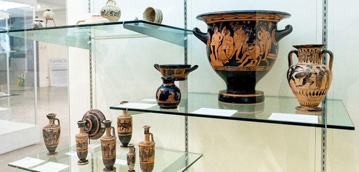vases sitting in a case