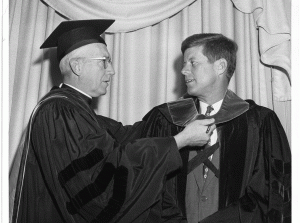 Laurence McGinley, S.J., president of Fordham, presenting John F. Kennedy with an honorary degree.
