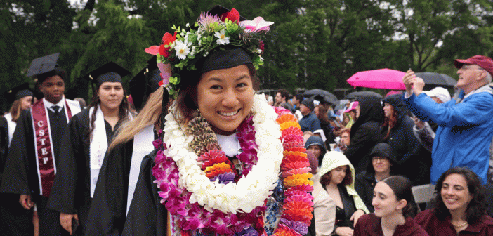 woman grad with Hawaiian leis