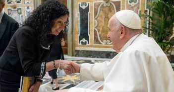 Angela O'Donnell shakes hands with Pope Francis